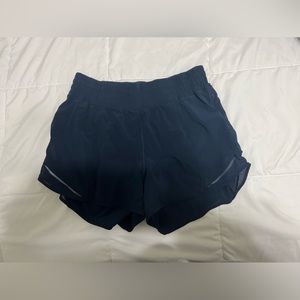 Lululemon track that high rise 5 inch short in true navy size 10
